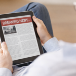 Existential Anxiety Breaking news on the tablet screen