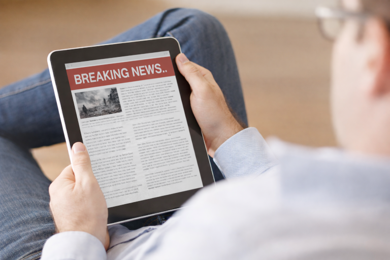 Existential Anxiety Breaking news on the tablet screen